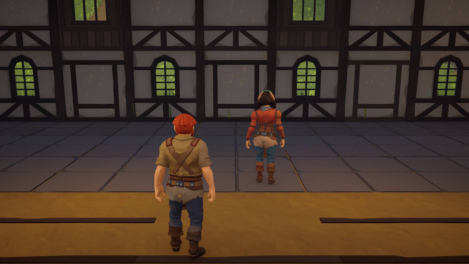Two keepers walking into the tavern hall past arched windows